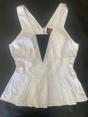 NWT Bebe 2b white black cutout mesh peplum top
